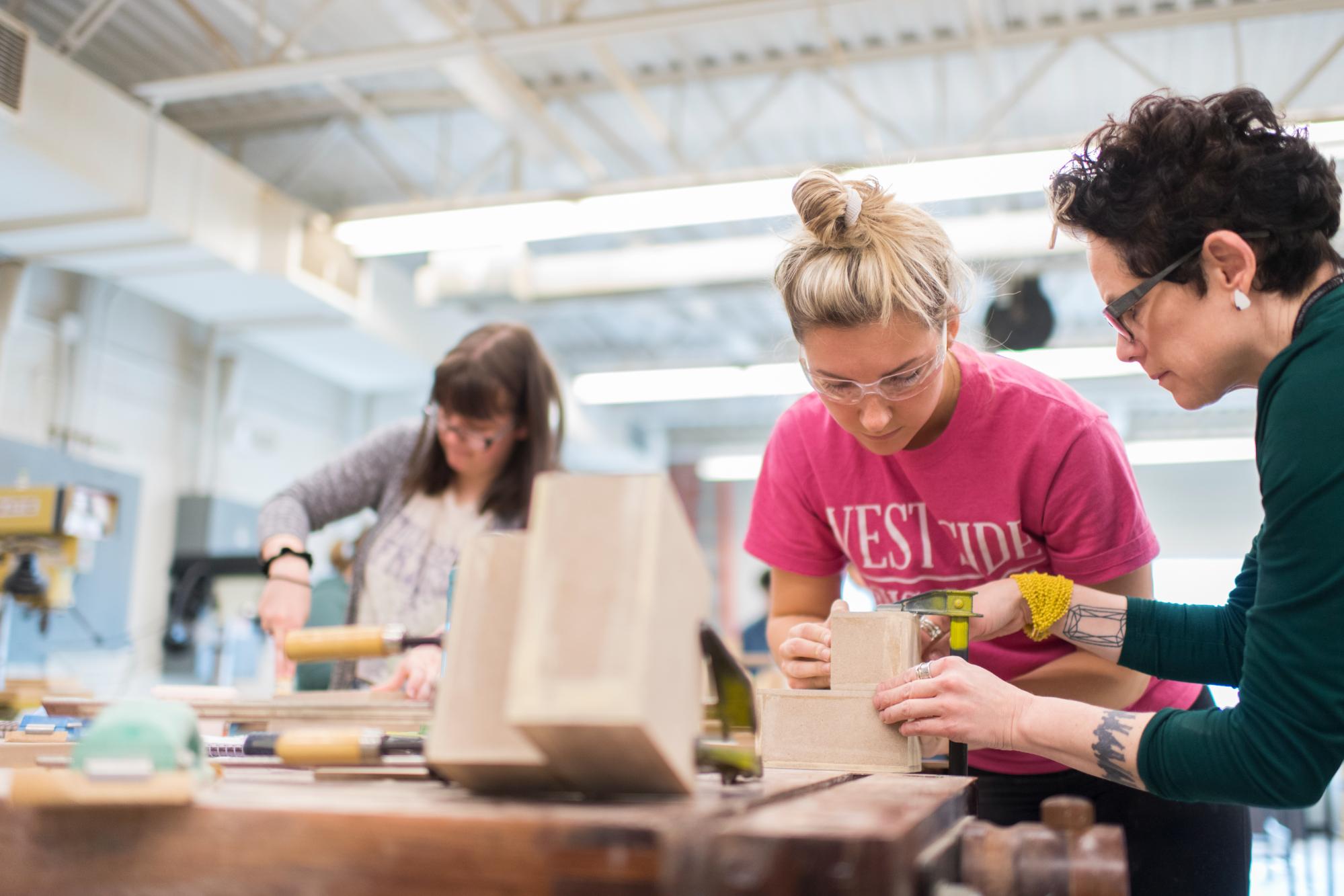 Students in 3D DEsign working in the Sculpture Woodshop
